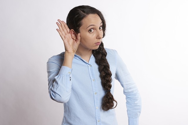 A woman is listening attentively