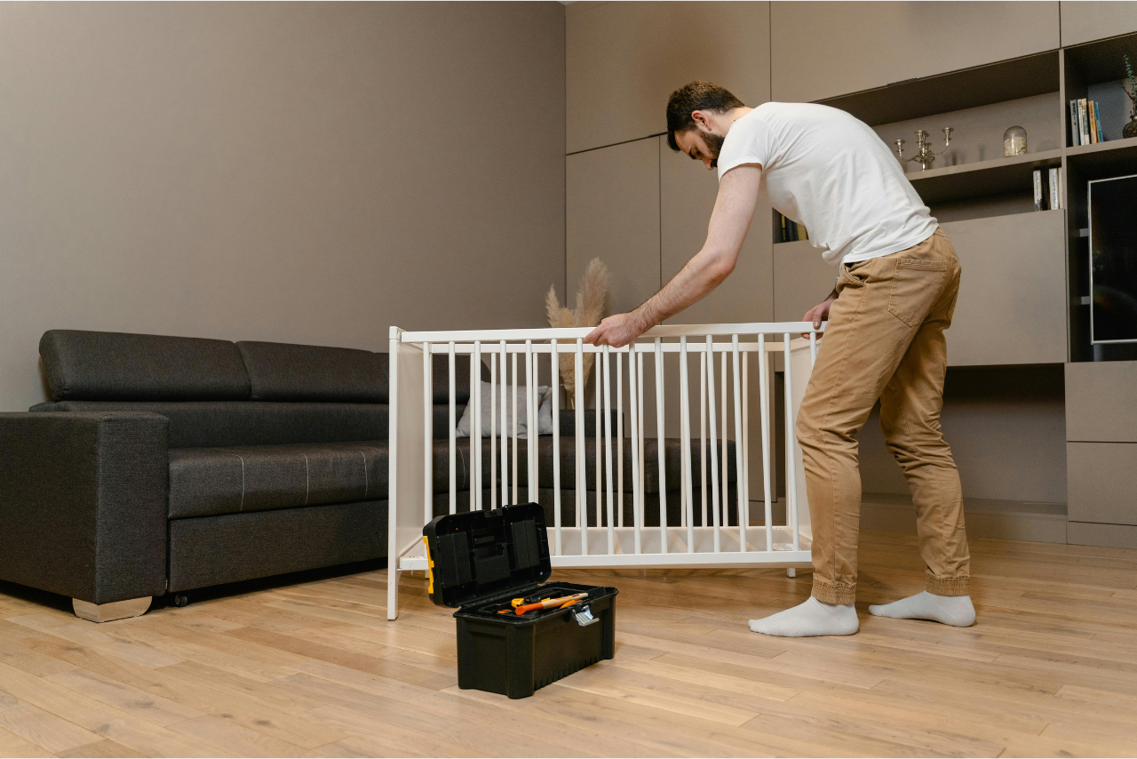 A man is assembling furniture