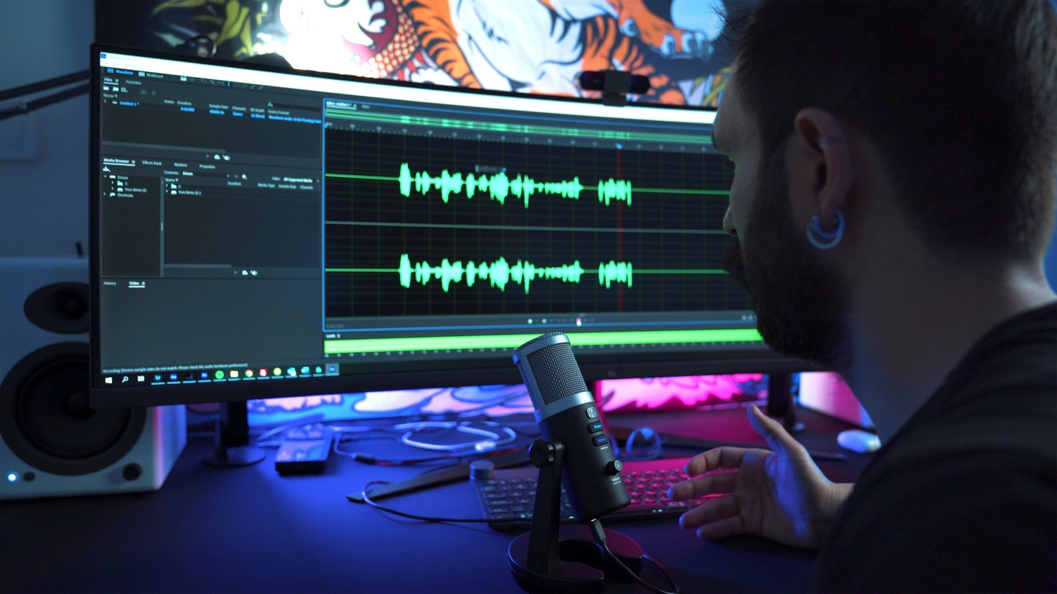 A man recording a vlog about tech.