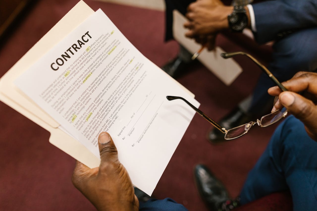 A person holding a contract