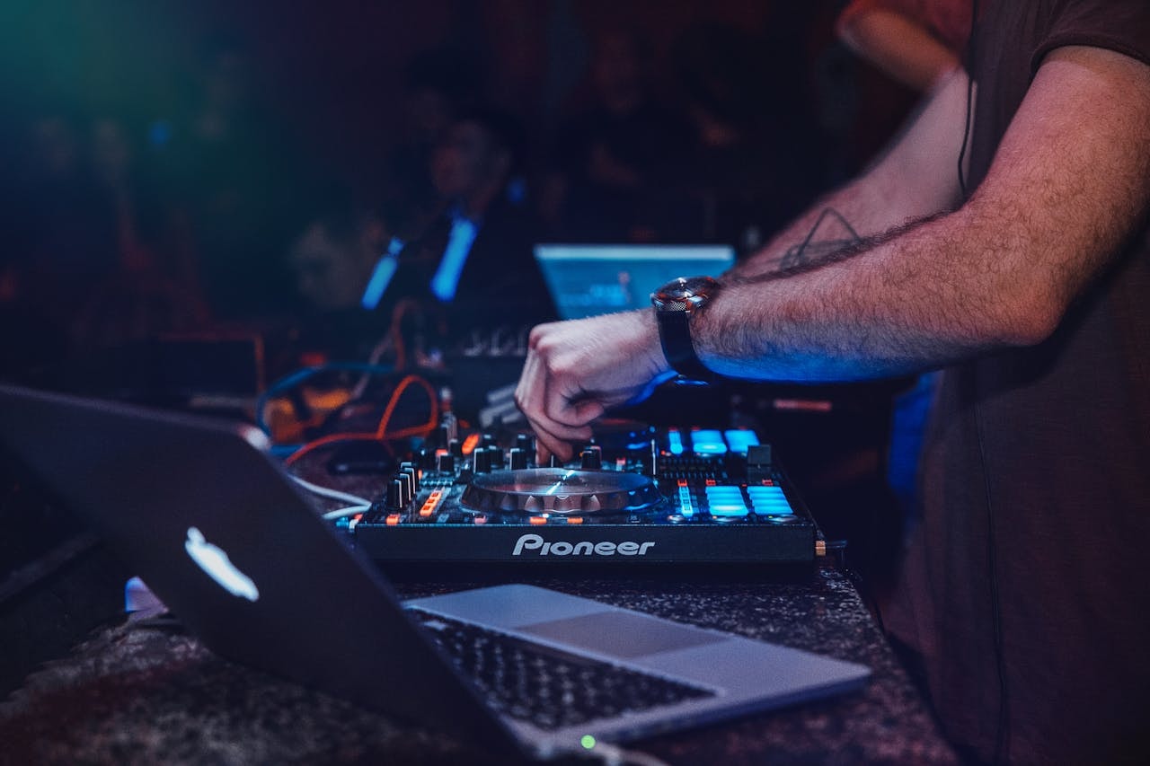 A person playing a DJ turntable