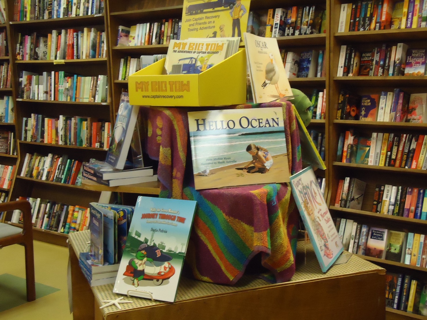 Selling books in a store.