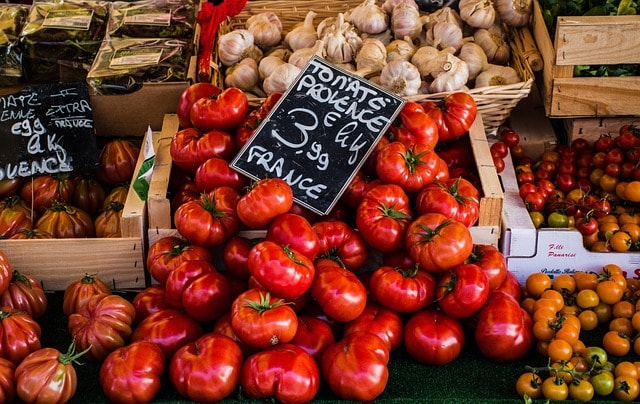 Tomatoes, garlic, greens in the shop