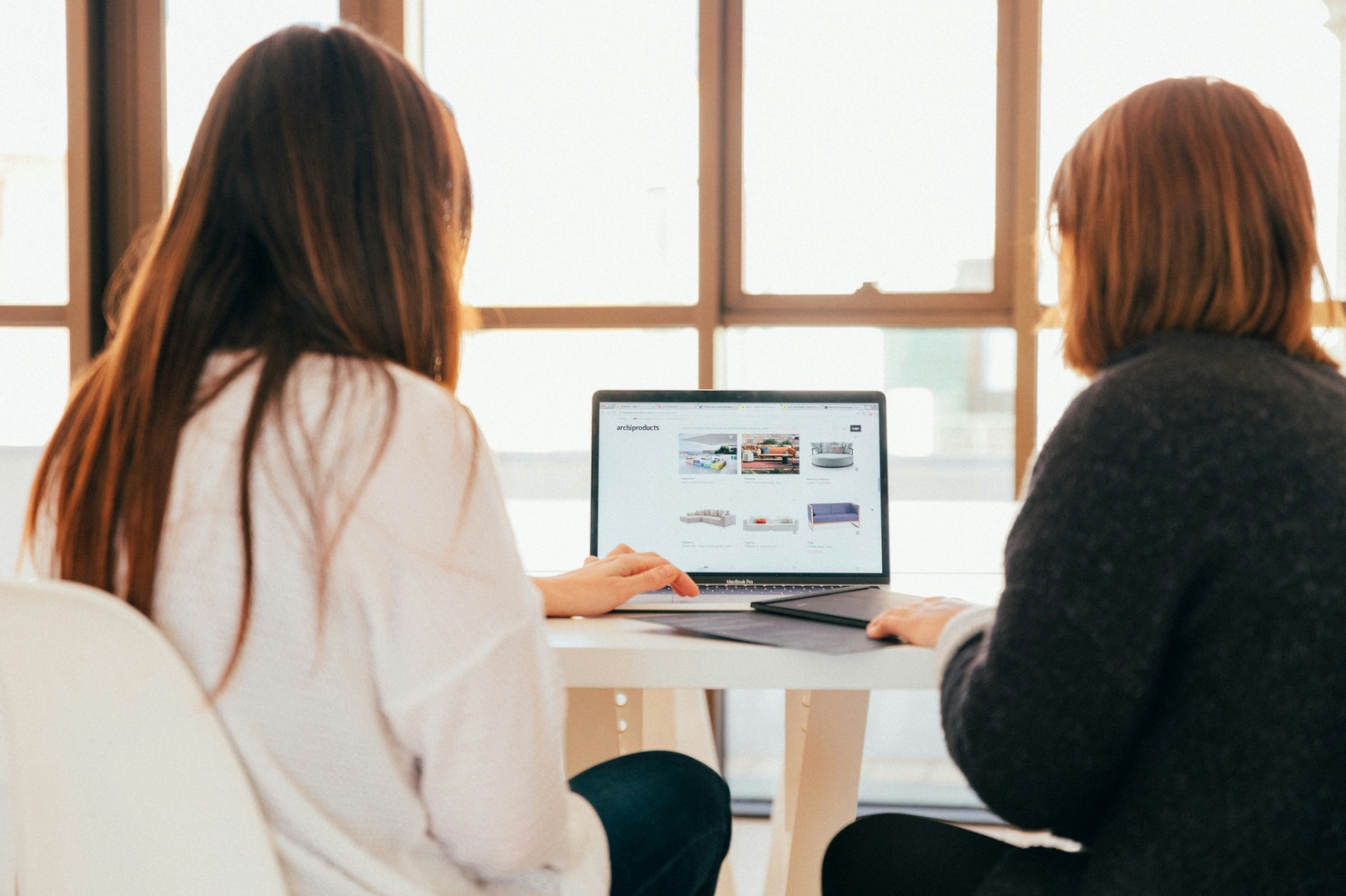 Women looking at a website.