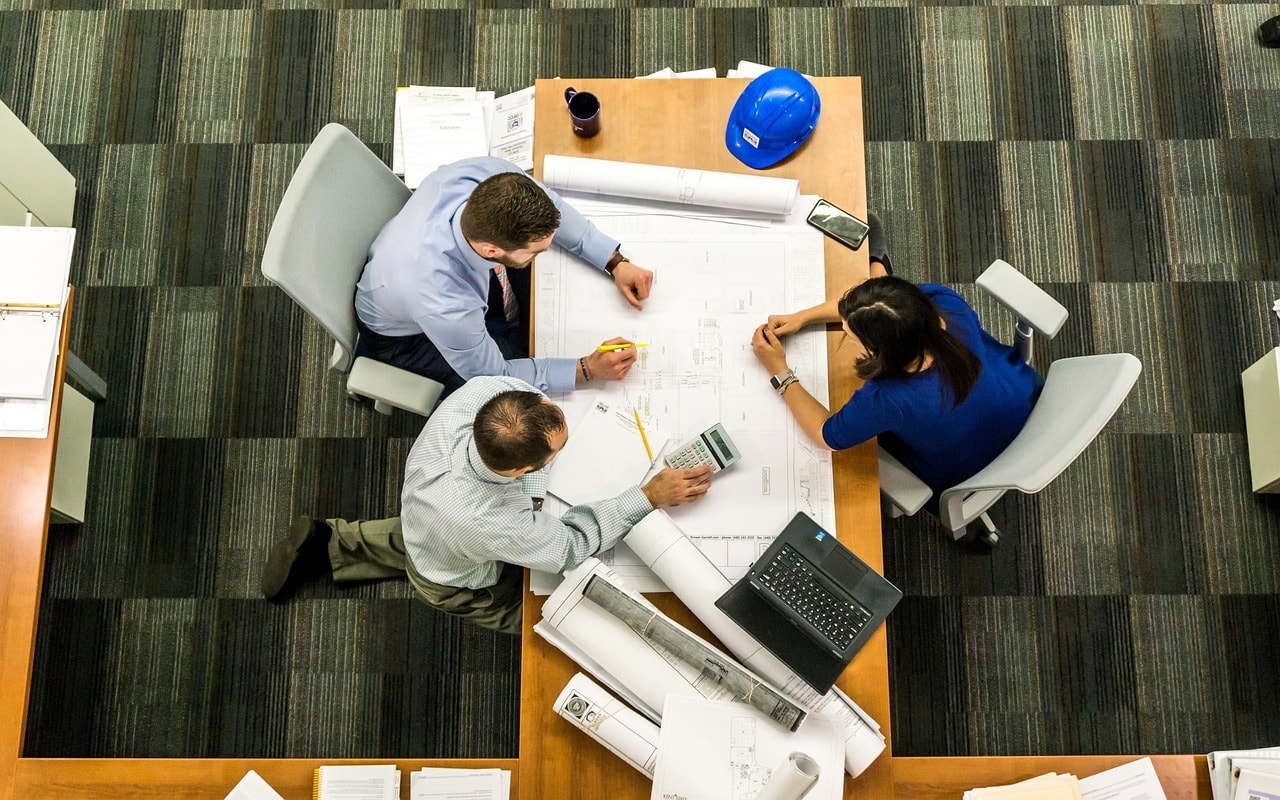 A business meeting discussing the structure of a company.