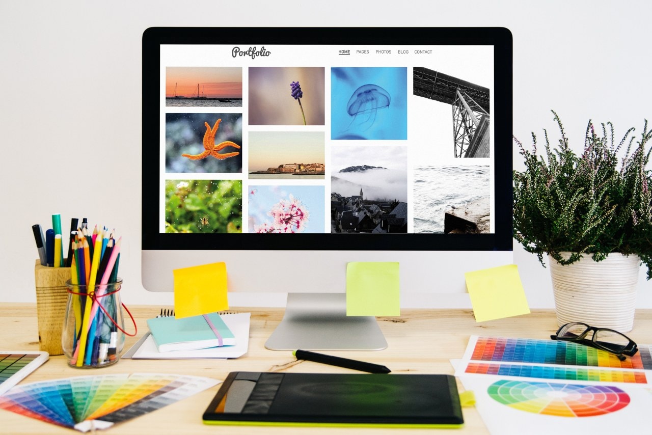 A computer screen displaying a portfolio showcasing various pieces of work.