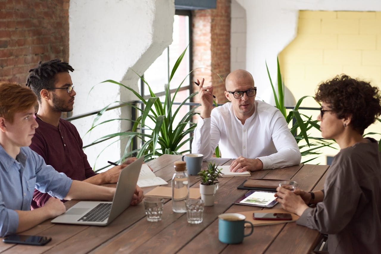 A photo of people in a business meeting