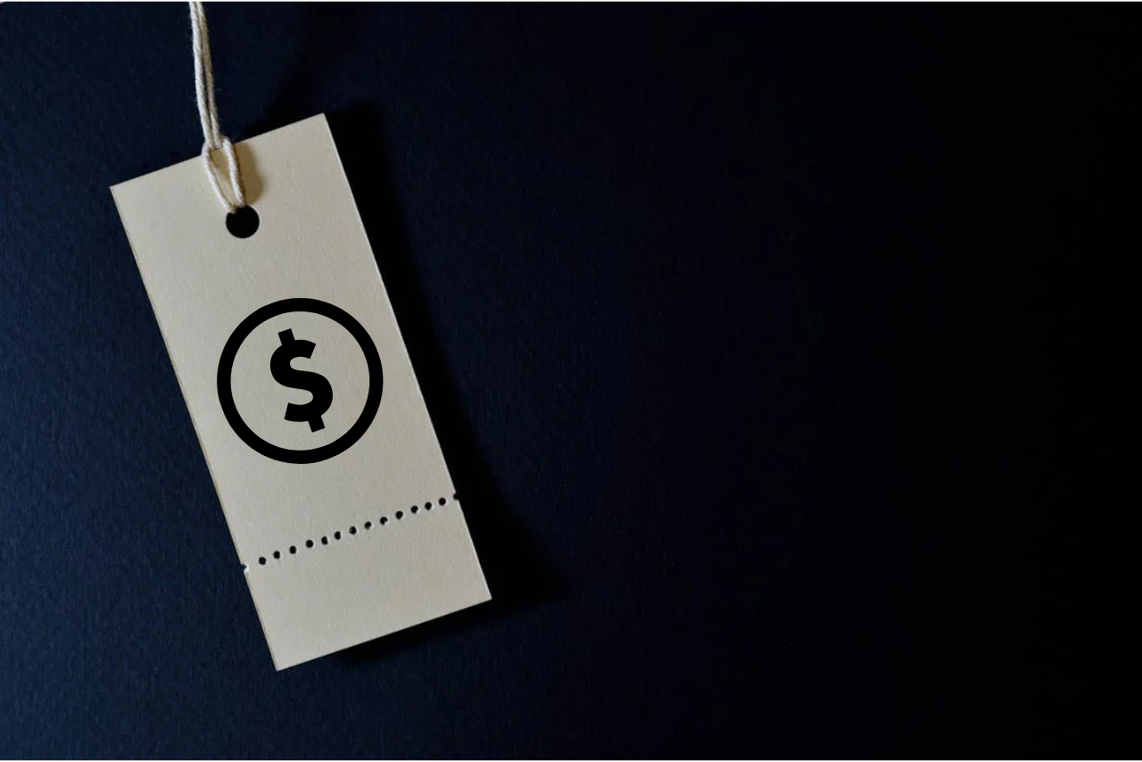 A price tag with a dollar sign displayed on it.