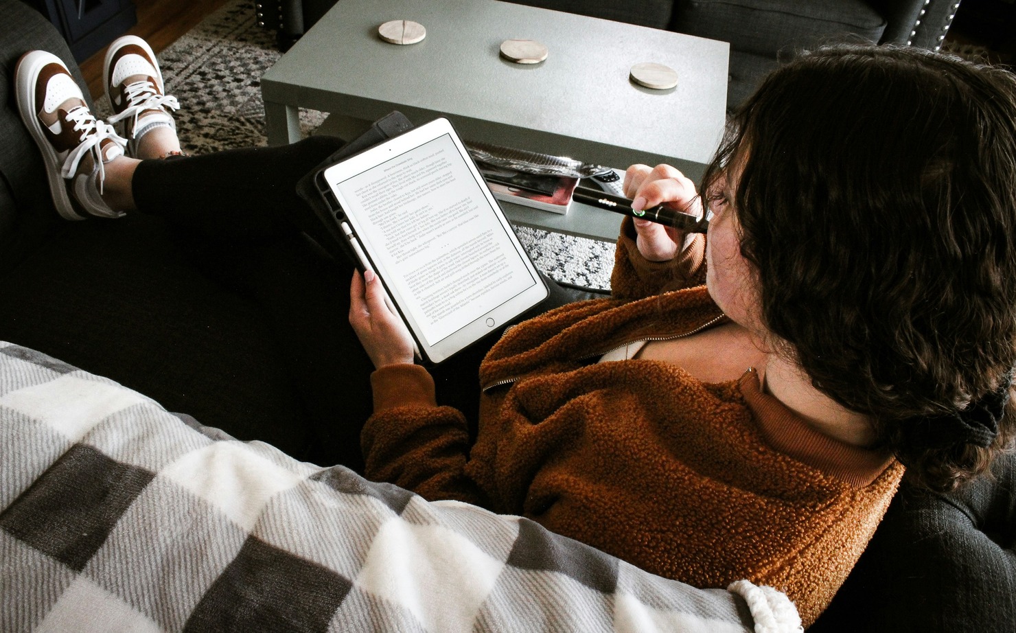 A woman reading an ebook.