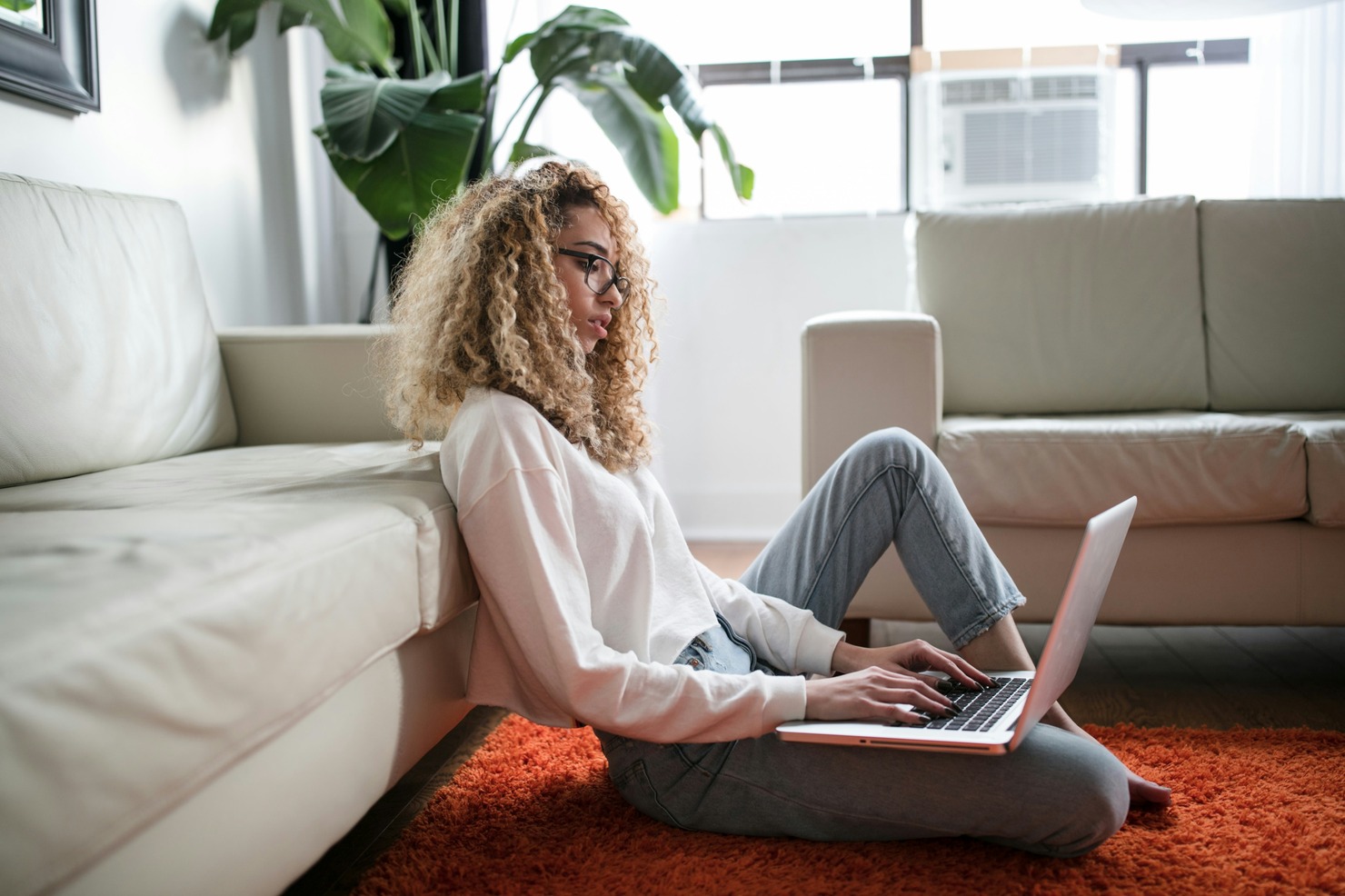 A woman typing.