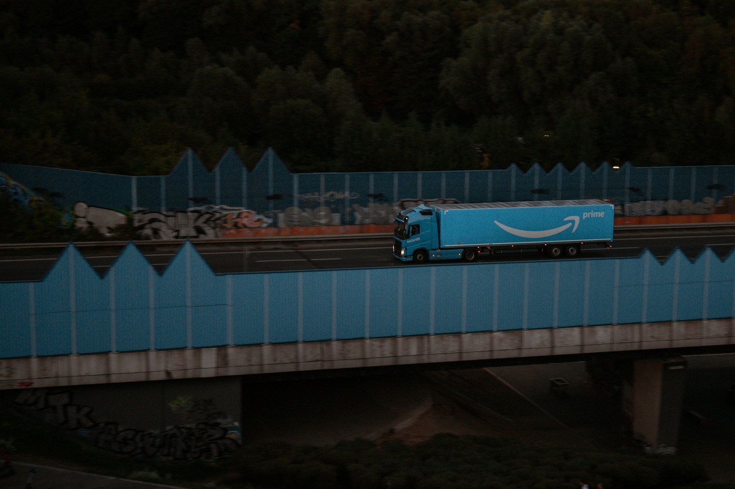 Amazon truck delivering products.