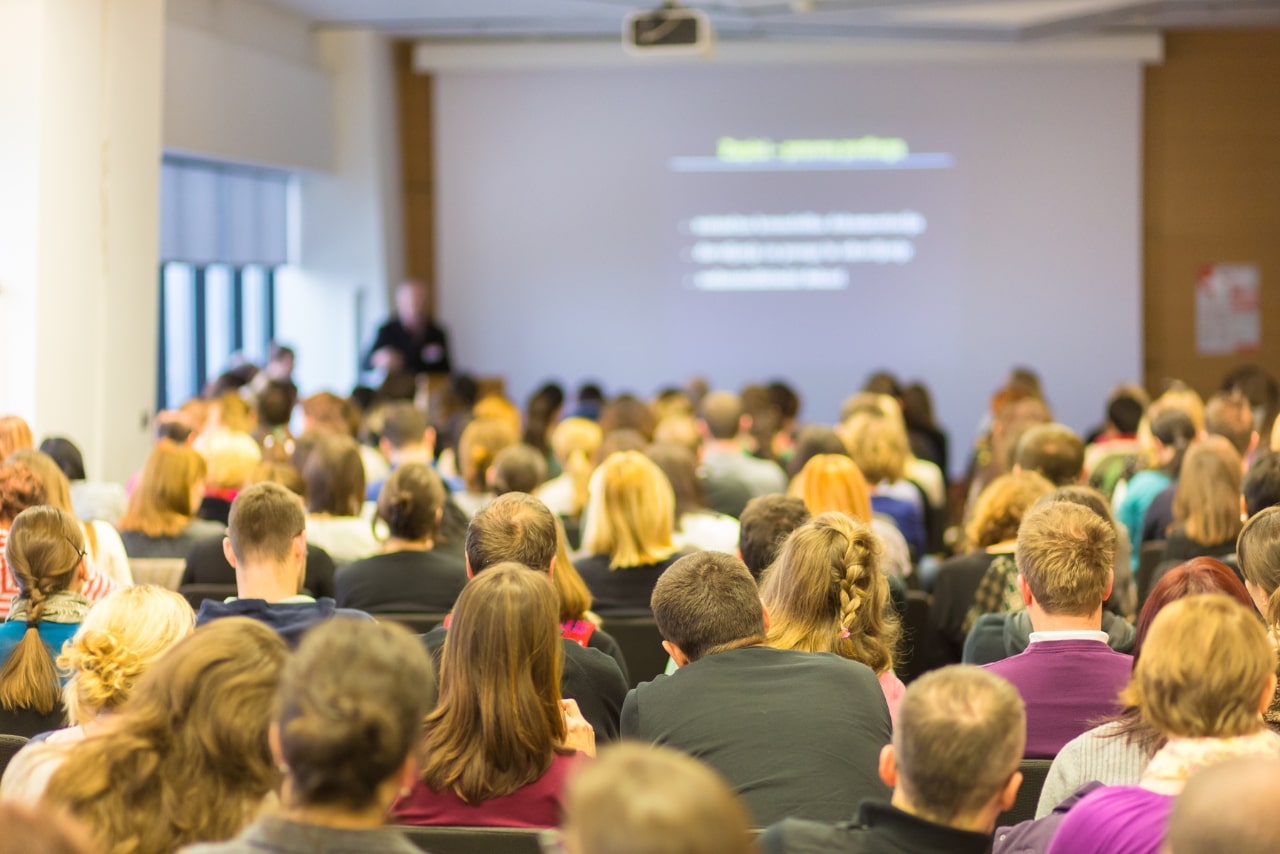 Audience at a lecture hall.