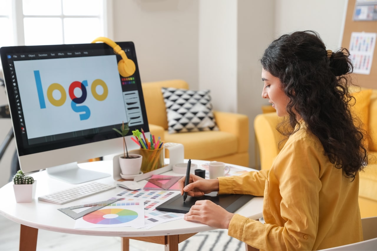 Graphic designer working in home office.