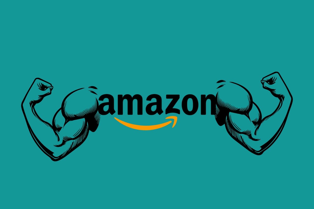 Hands flexing in strength are displayed over the Amazon logo.