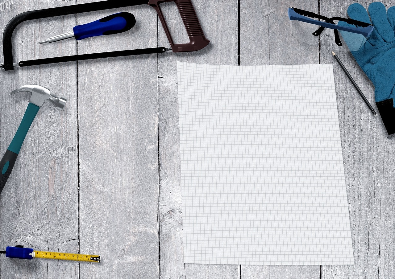 Handyman tools and a piece of blank paper.