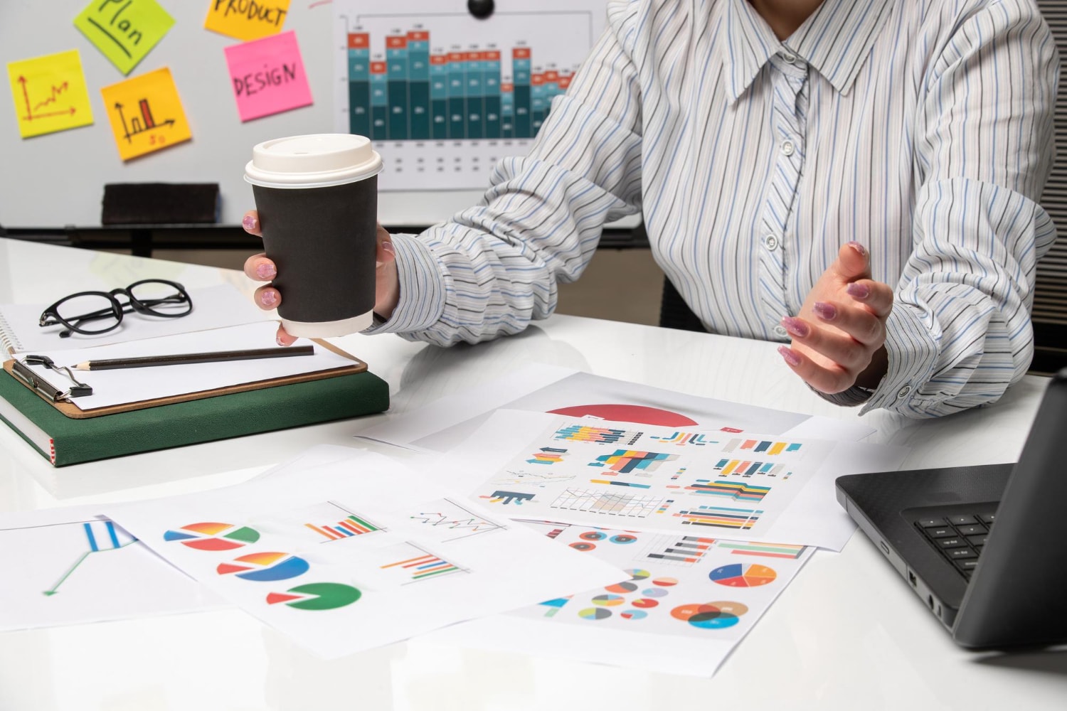Illustration of a person holding coffee at a work desk and studying data