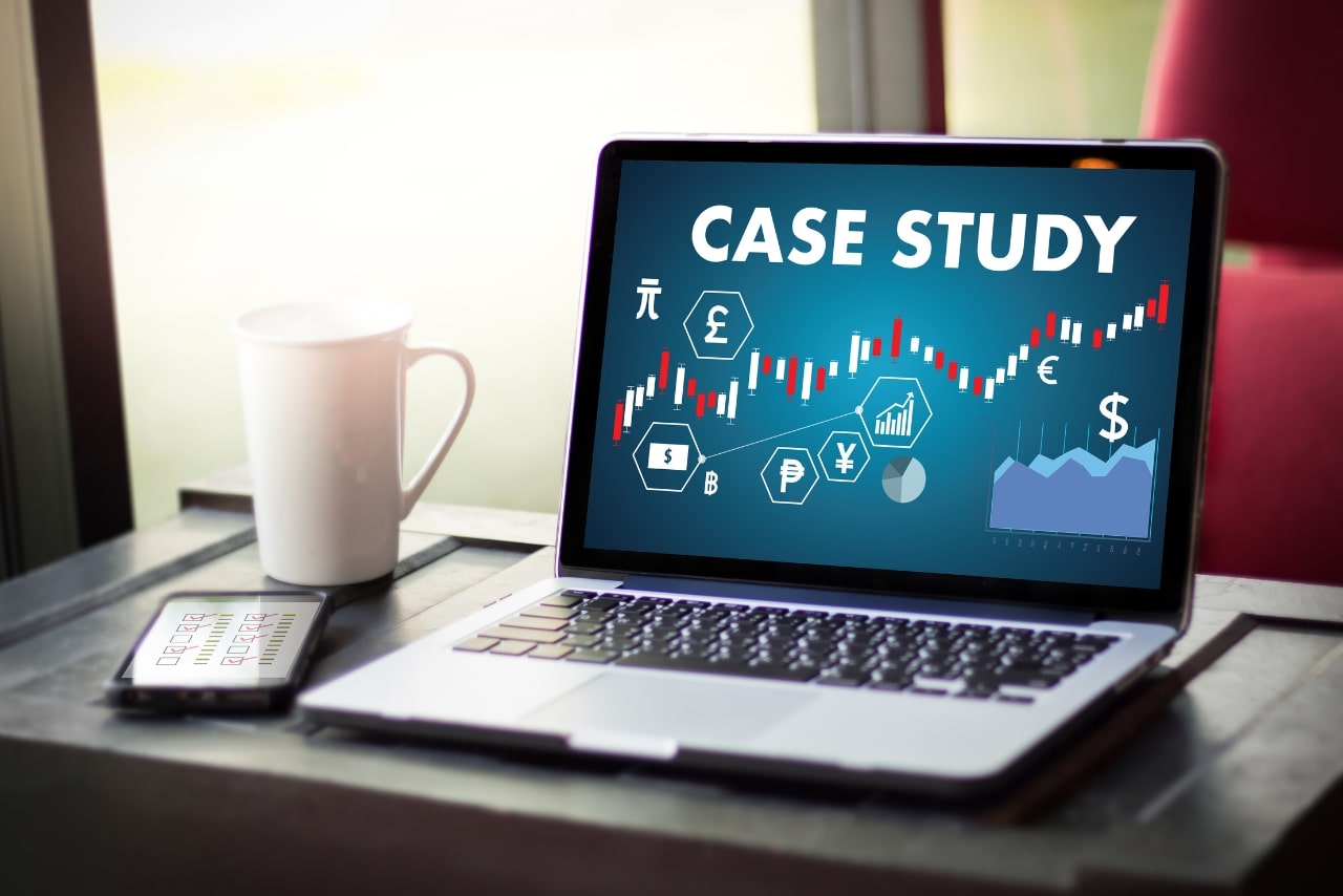Laptop showing Case Studies page on screen.