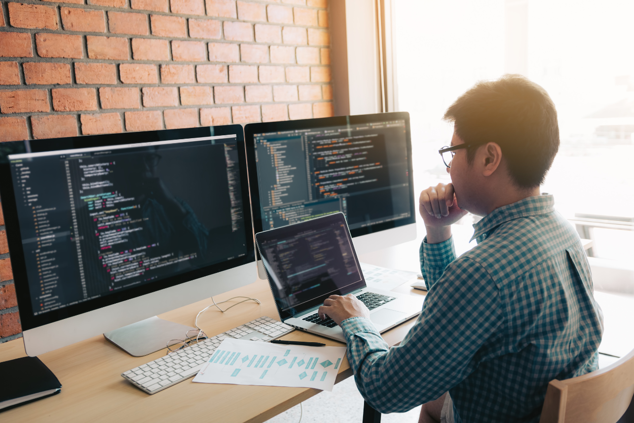 Man developing programming and coding technology.