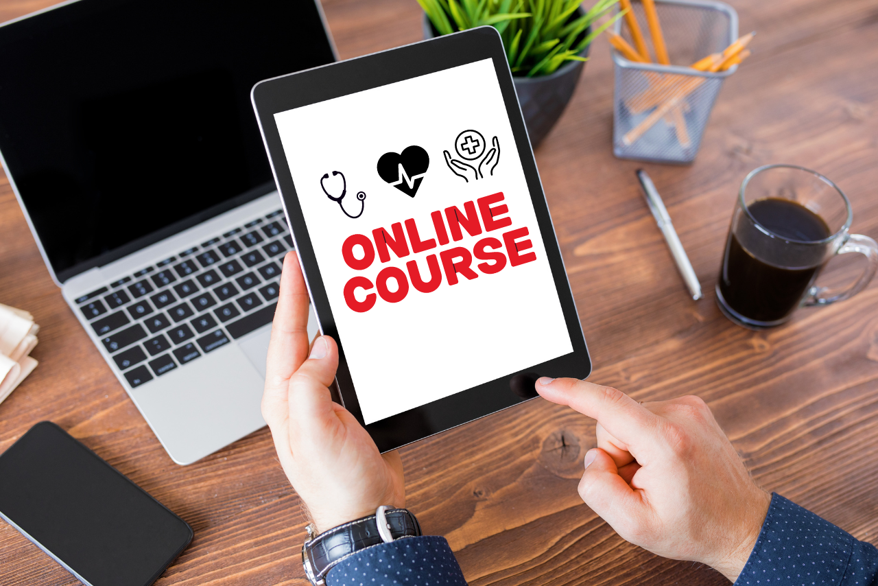 Person checking online medical course on ipad.