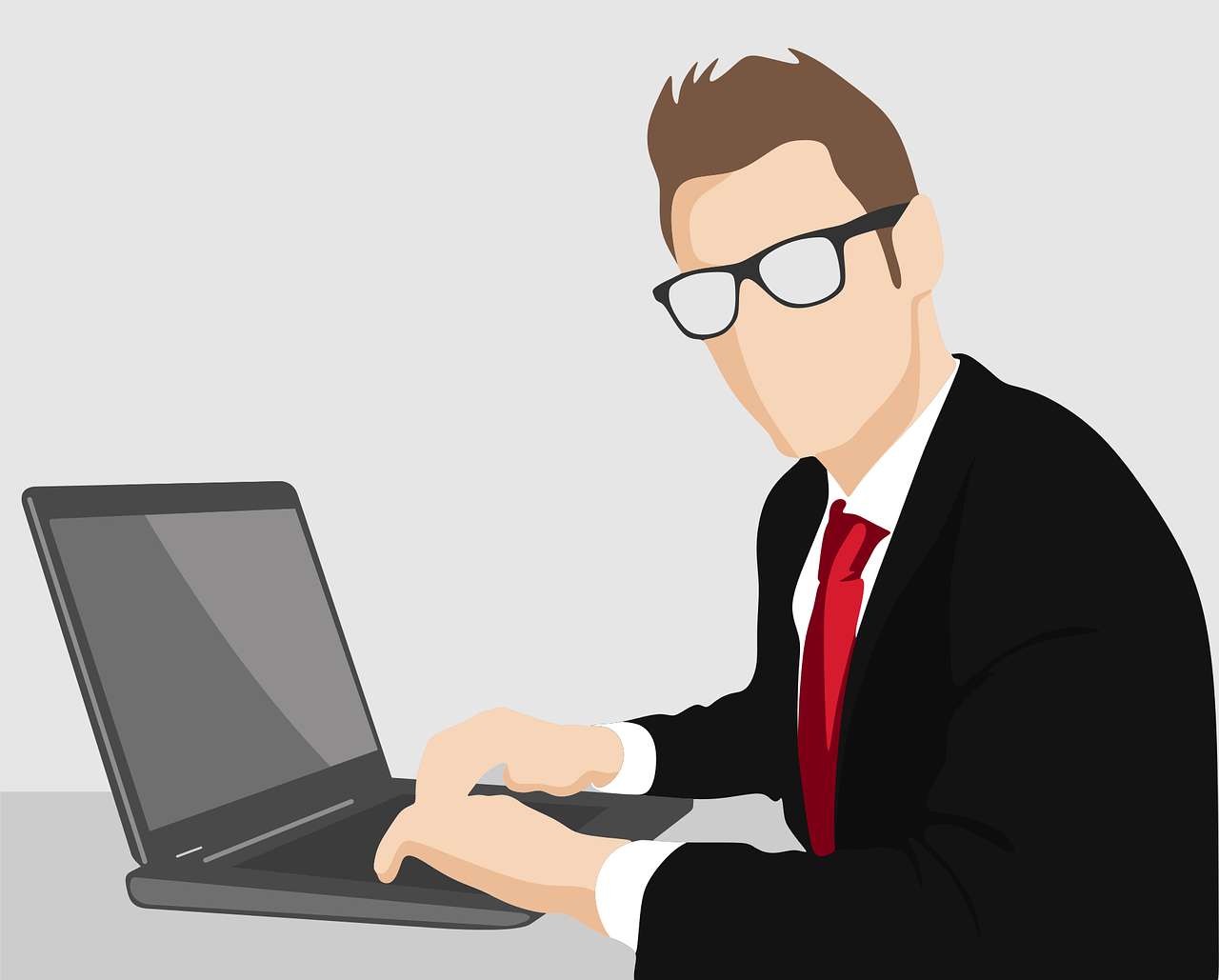 Professional man working with a laptop.