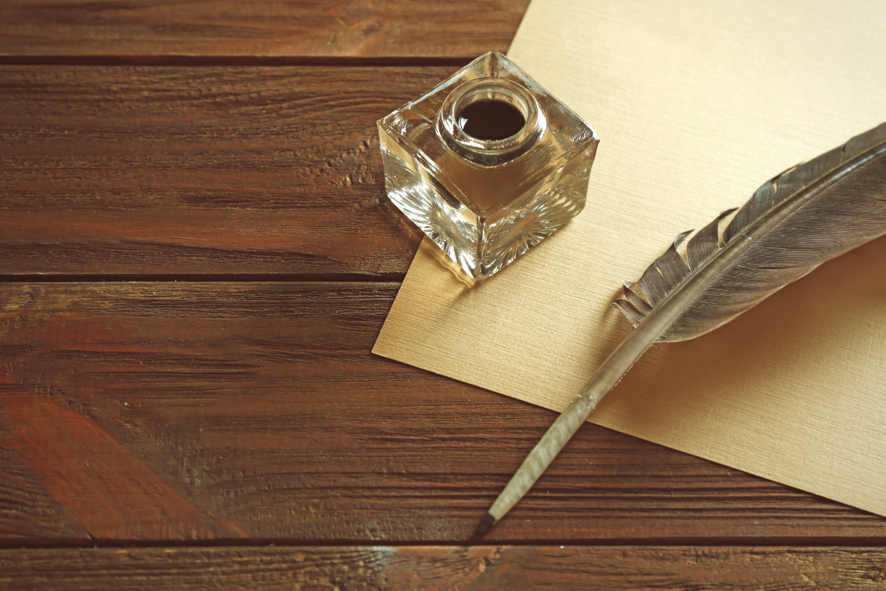 Quill with Ink and Paper
