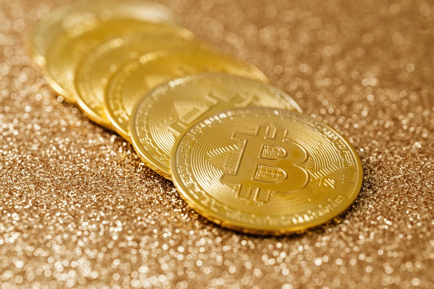 Several bitcoins displayed.