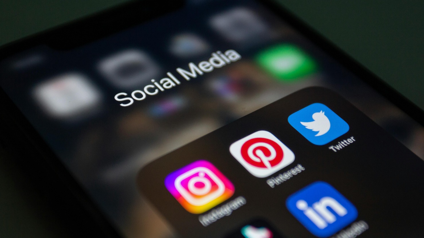 Smartphone's screen close up with social media app icons.