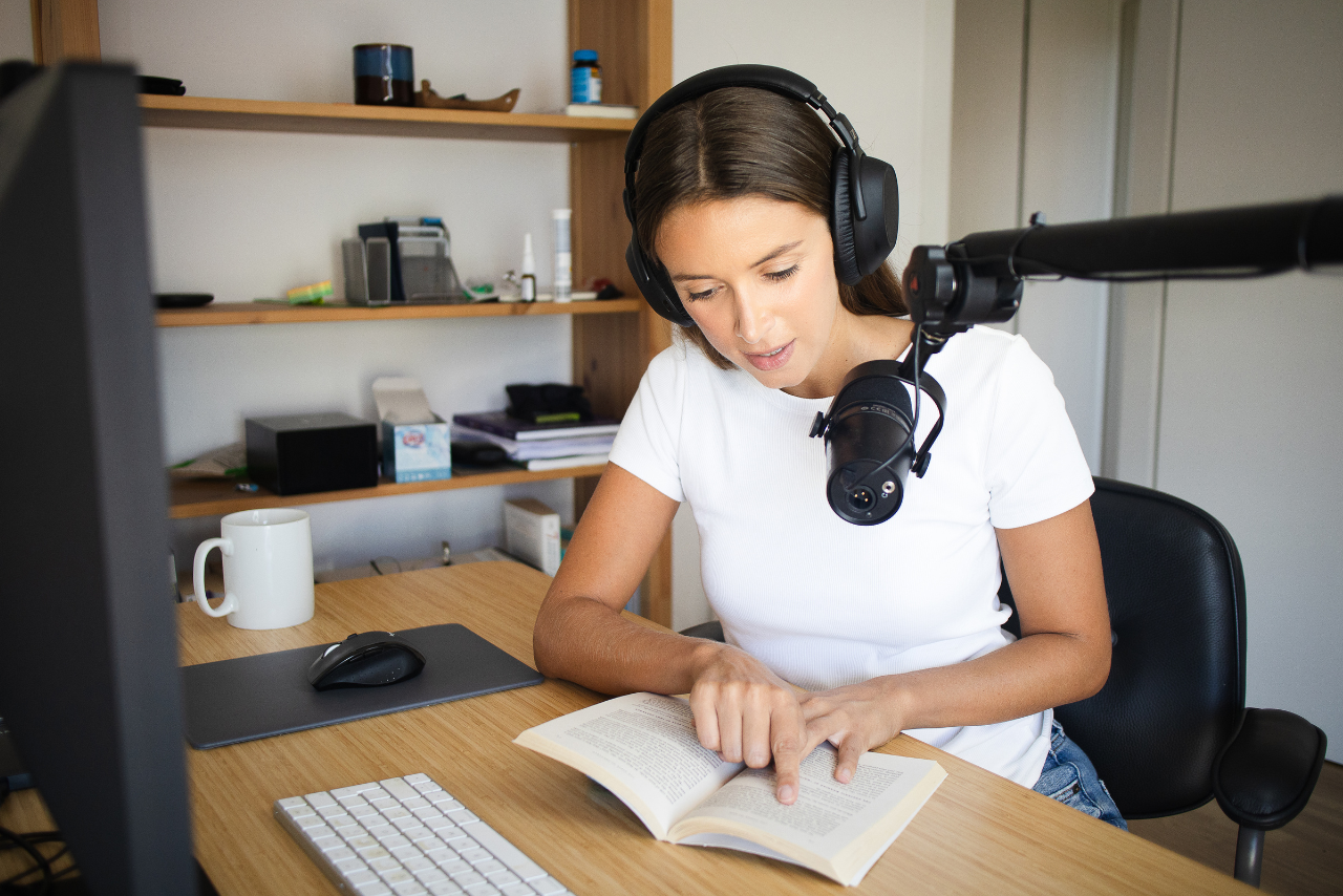 Woman recording her own audiobook.