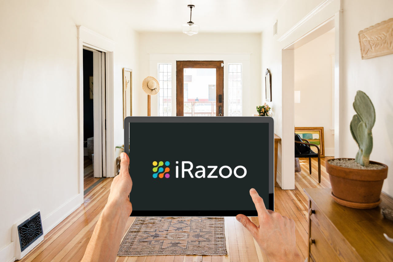 iRazoo logo on ipad while person accessing it.