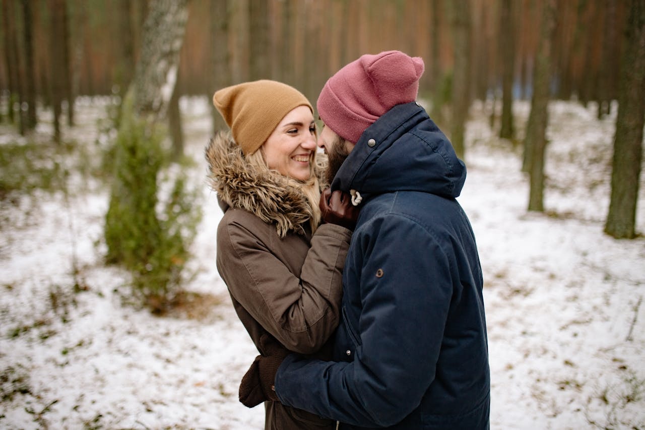 A couple wearing beanies