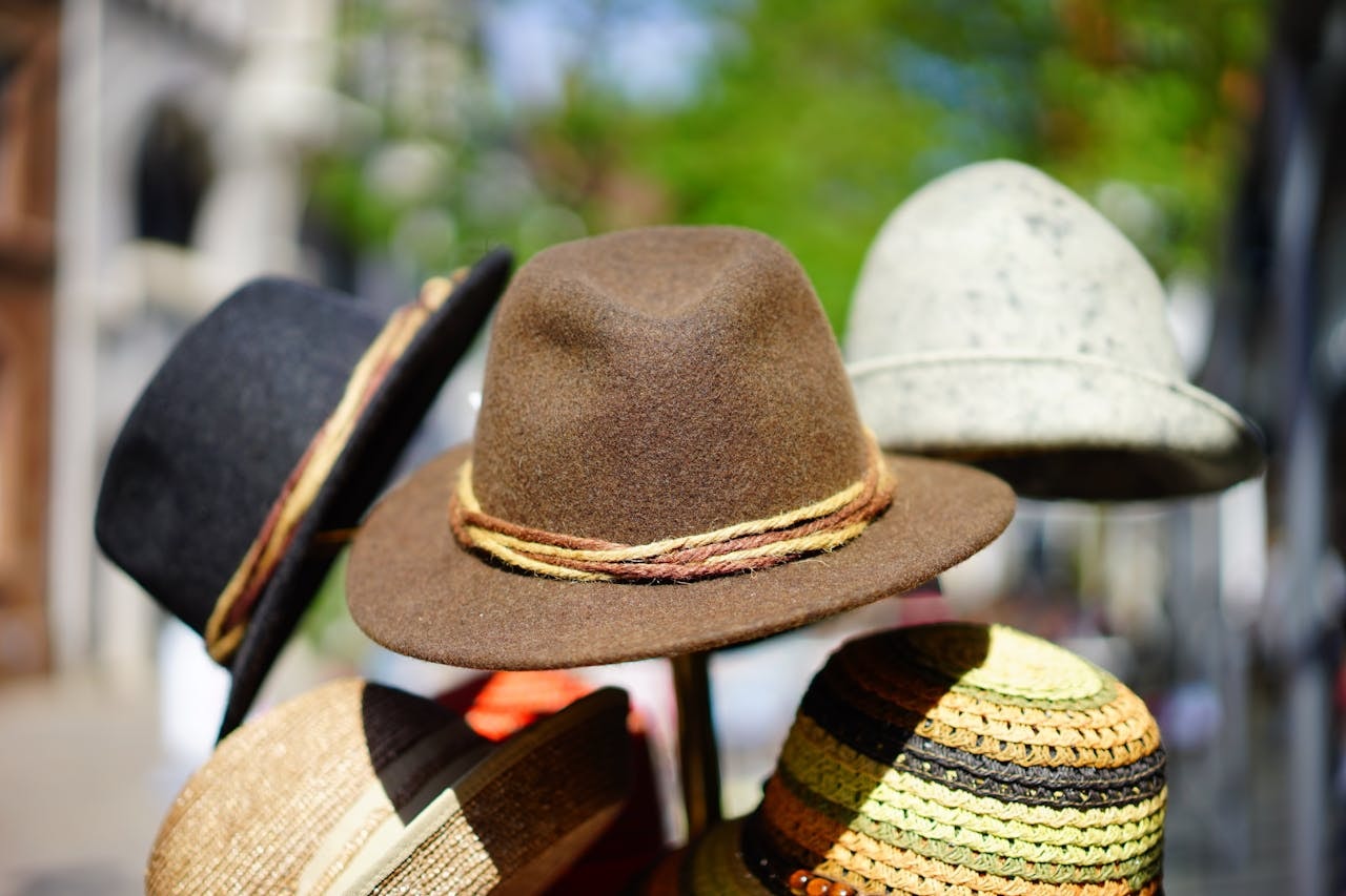 A display of fedora hats in different colors