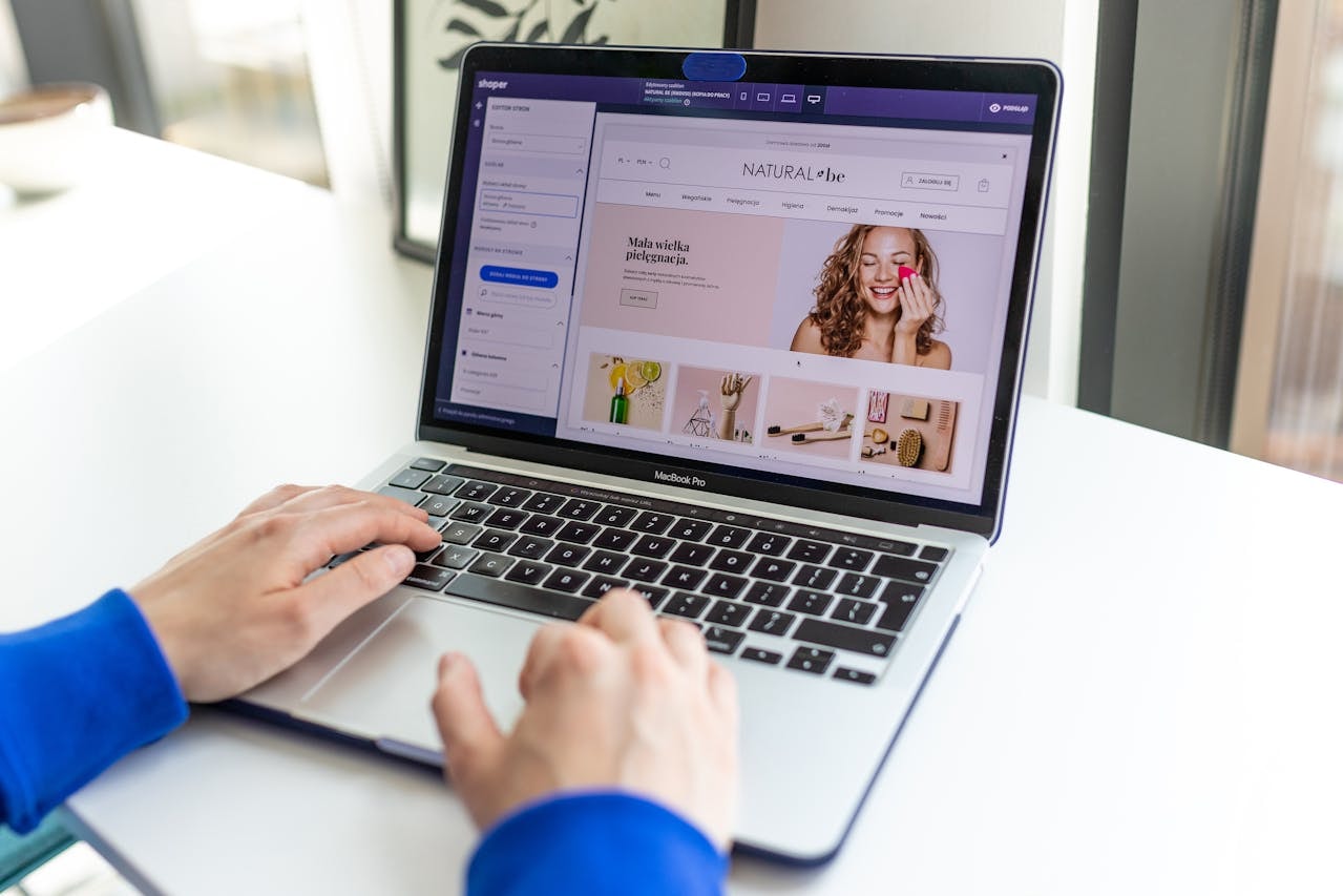 A person browsing an online store using a laptop