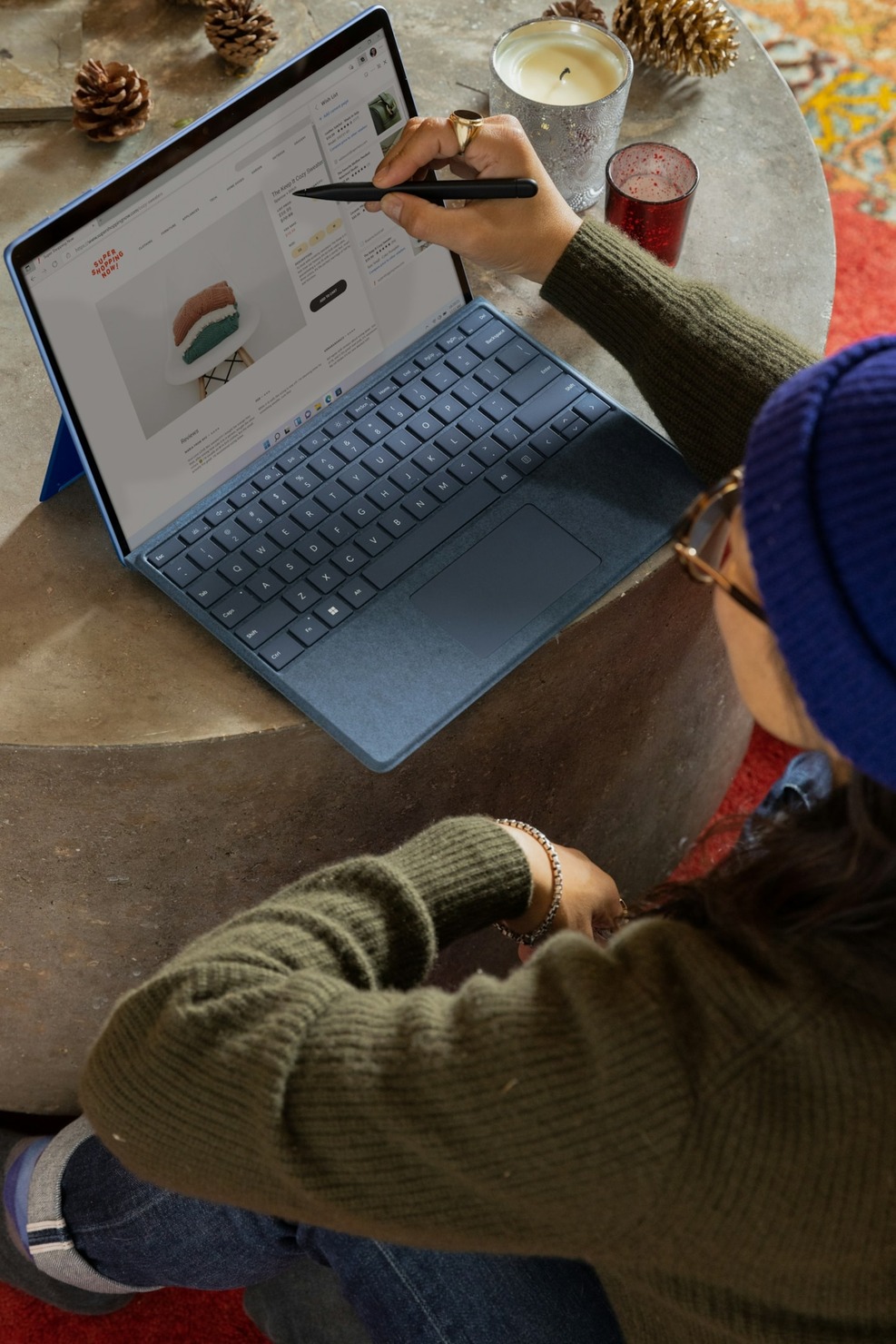 A person looking at an online store on a laptop screen