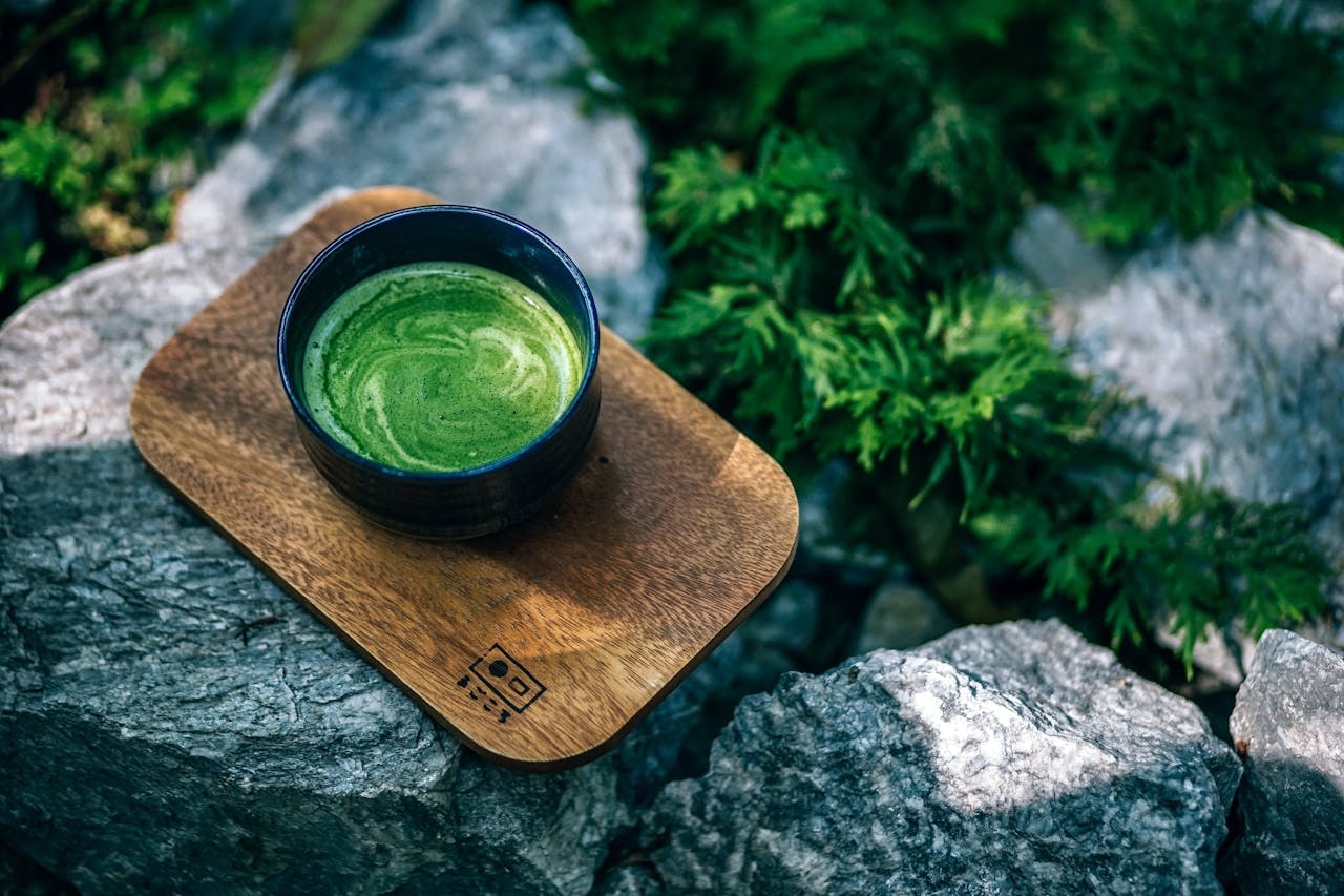 A photo of a matcha drink in a cup