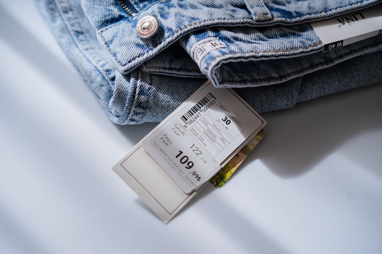 A price tag of 109.99 attached to a pair of jeans