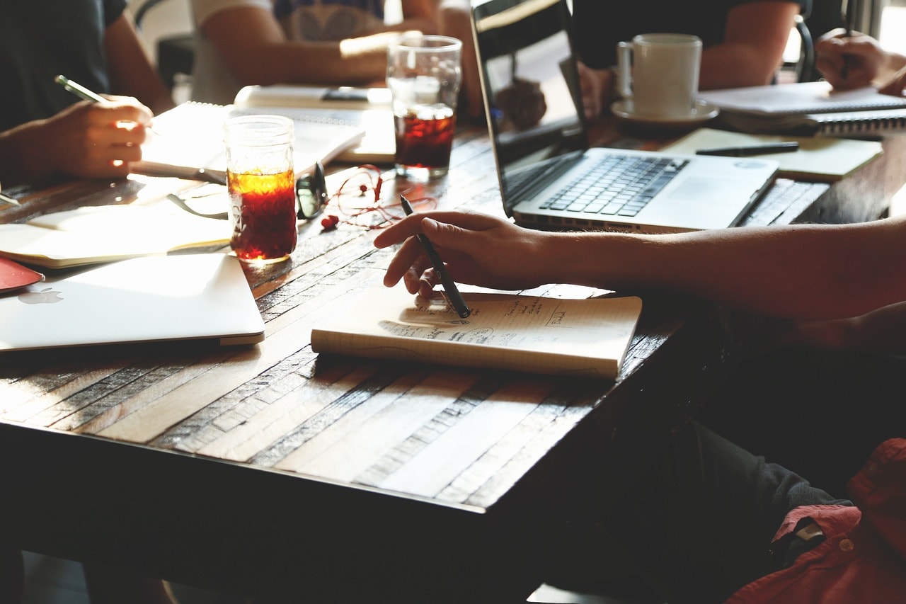 A team of founders in a meeting.