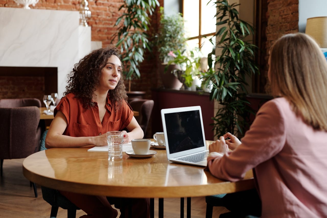 A woman interviewing an applicant