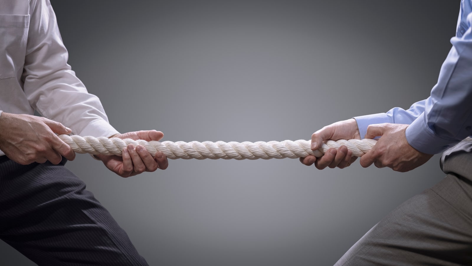 Business competition tug of war.