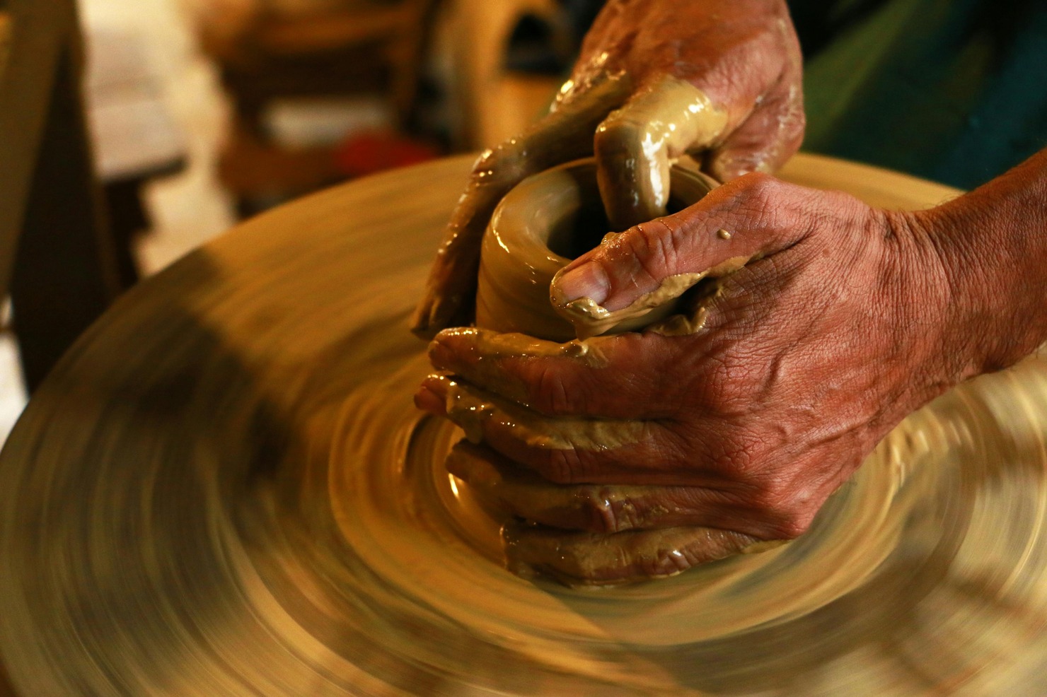 Close-up of Person Molding Clay.