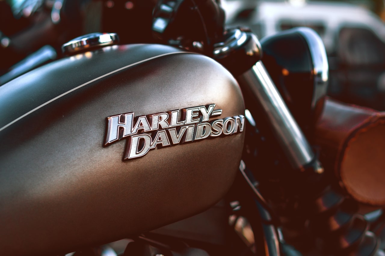 Close-up photo of a Harley Davidson Motorcycle, a rebel personality brand.