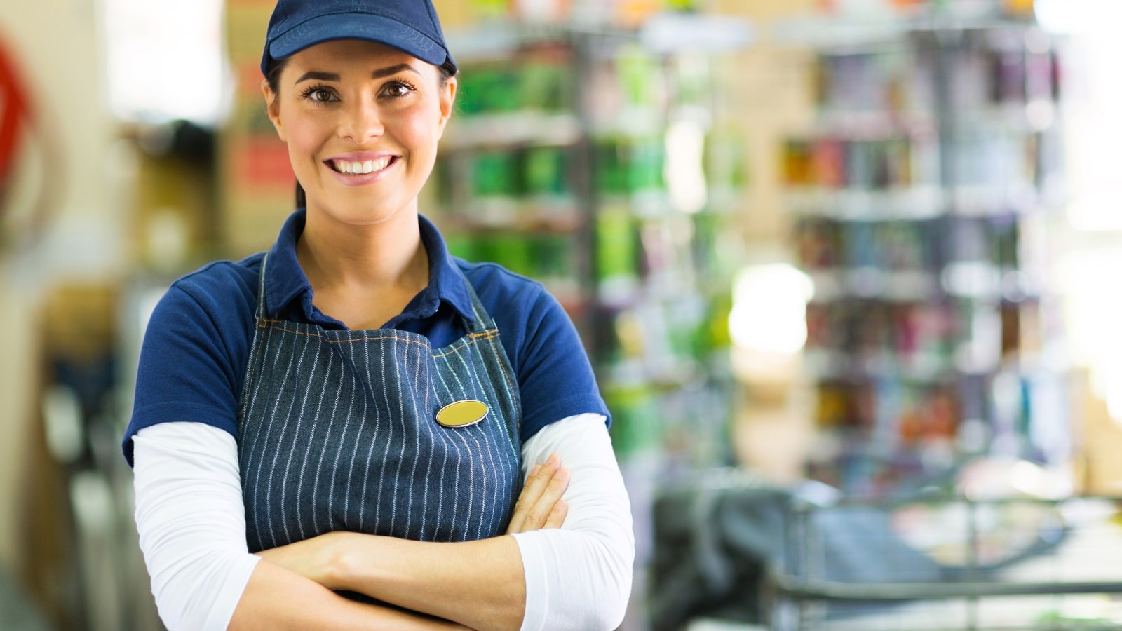 Female business employee smiling.