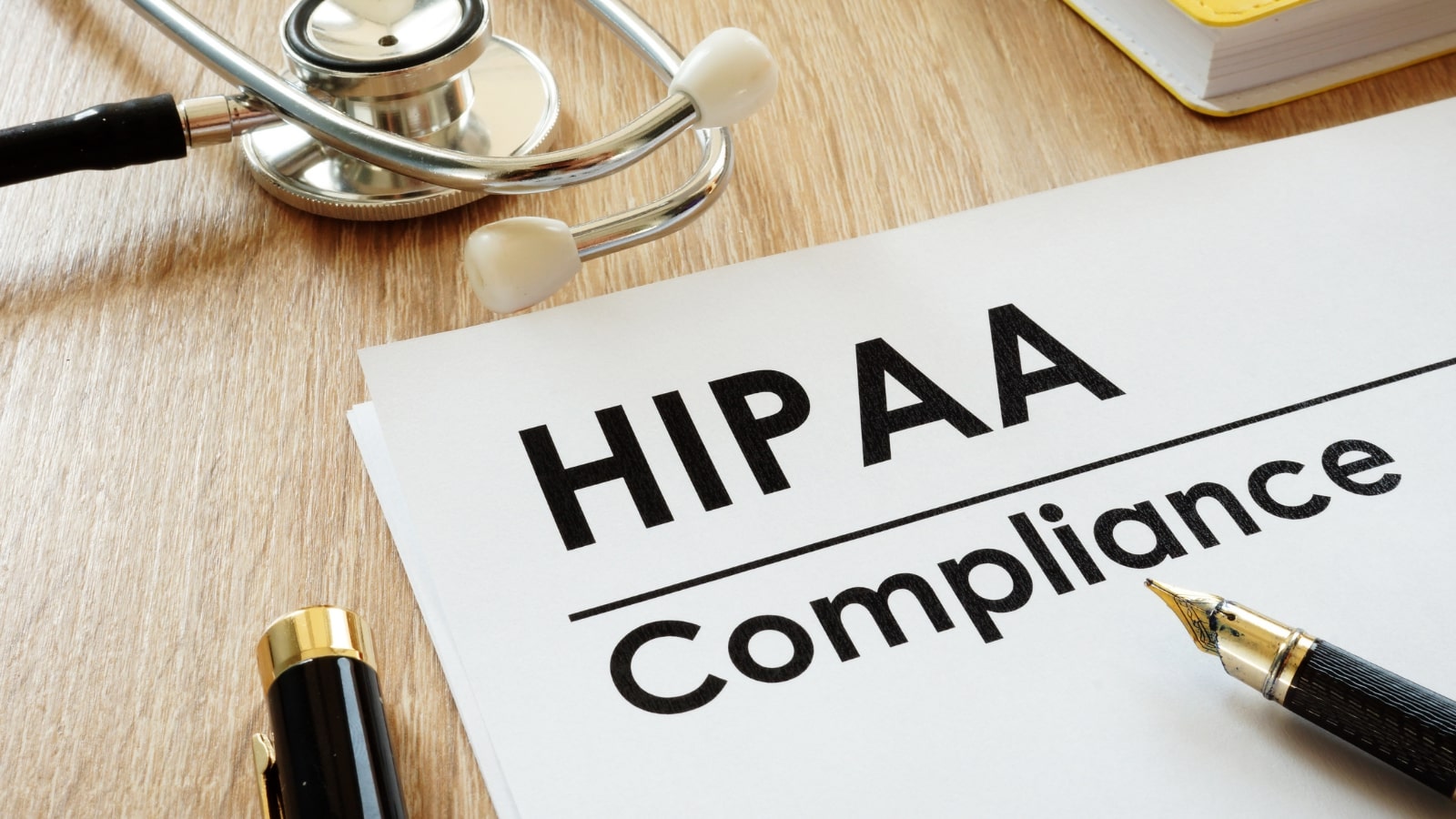 HIPAA compliance paper with stetoscope.