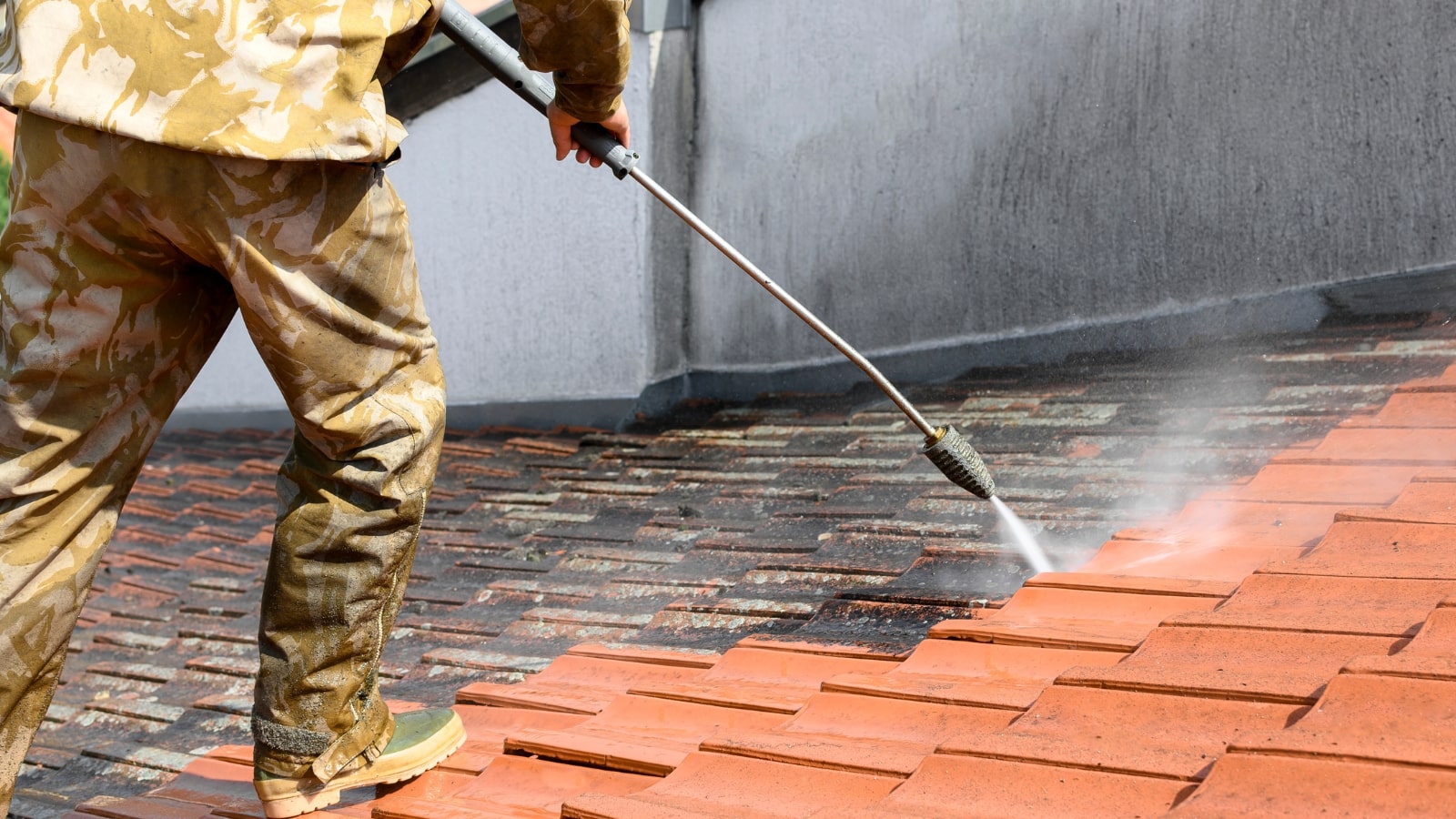 High pressure washing of rooftop.