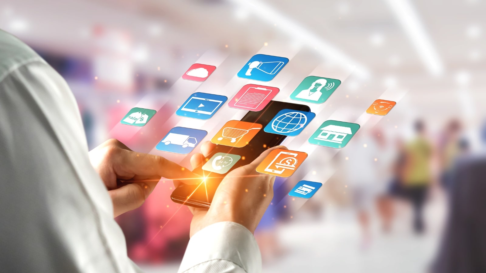 Multiple marketing channel icons coming out from smartphone.