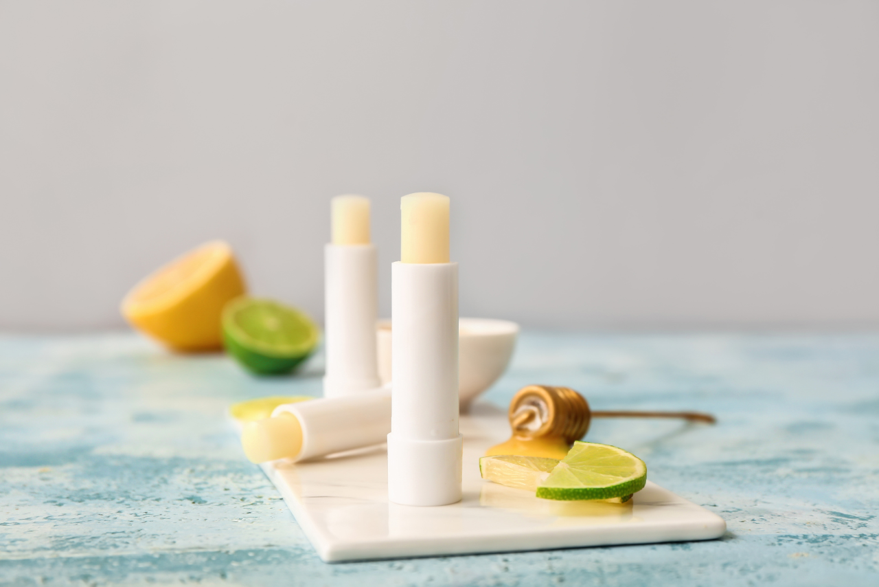 Natural Lip Balms with Lime on Table.