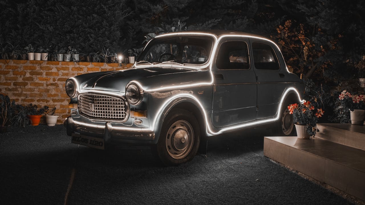 Neon lights on the edges of a vintage car