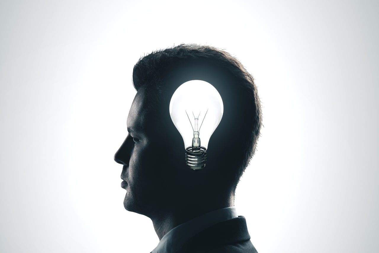 Person with lightbulb in head.
