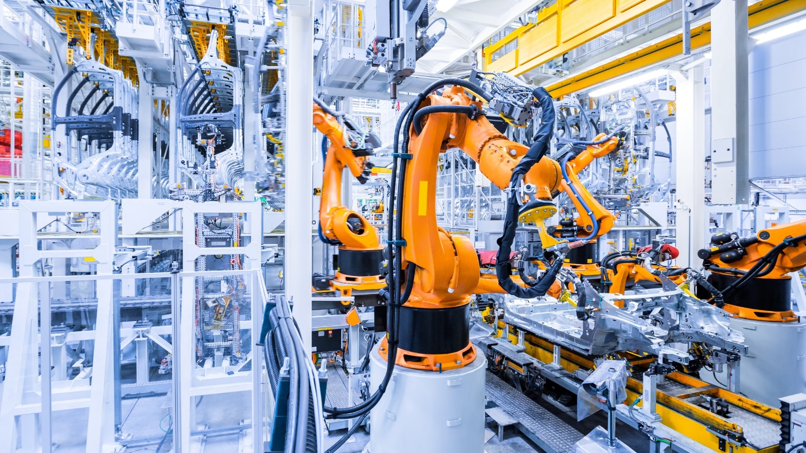 Robots in a car plant.