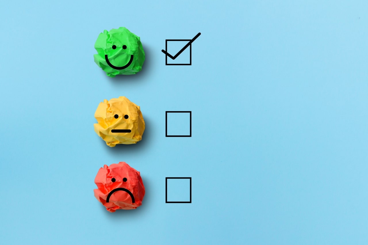 Select happy emoji on customer satisfaction evaluation.