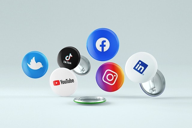 Social media 3D icons on bob pins floating around.
